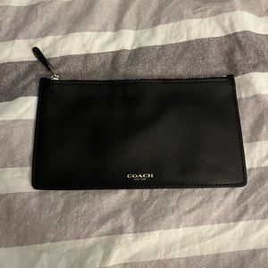 Black leather coach pouch